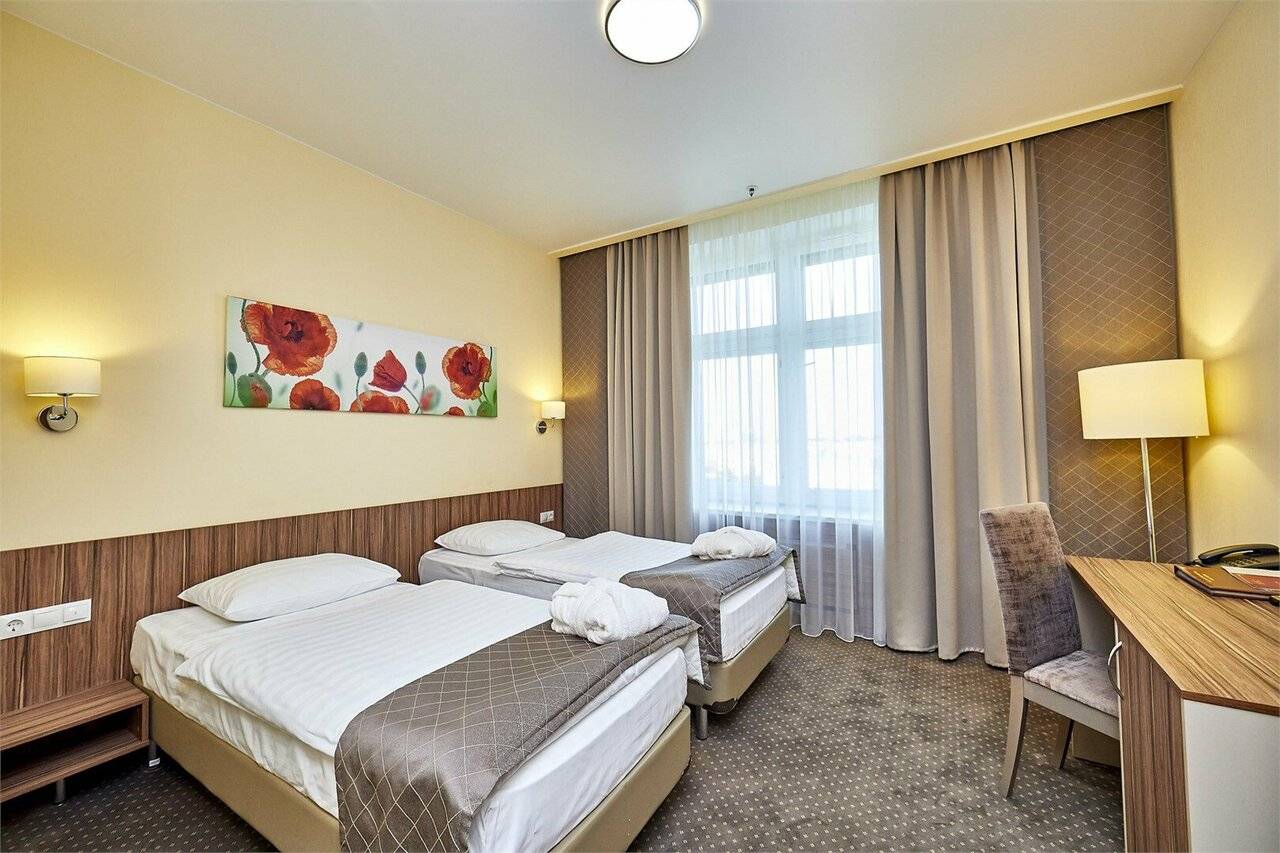 Фотографии номера Двухместный Бизнес с кондиционером в Гостинице Россия Санкт-Петербург