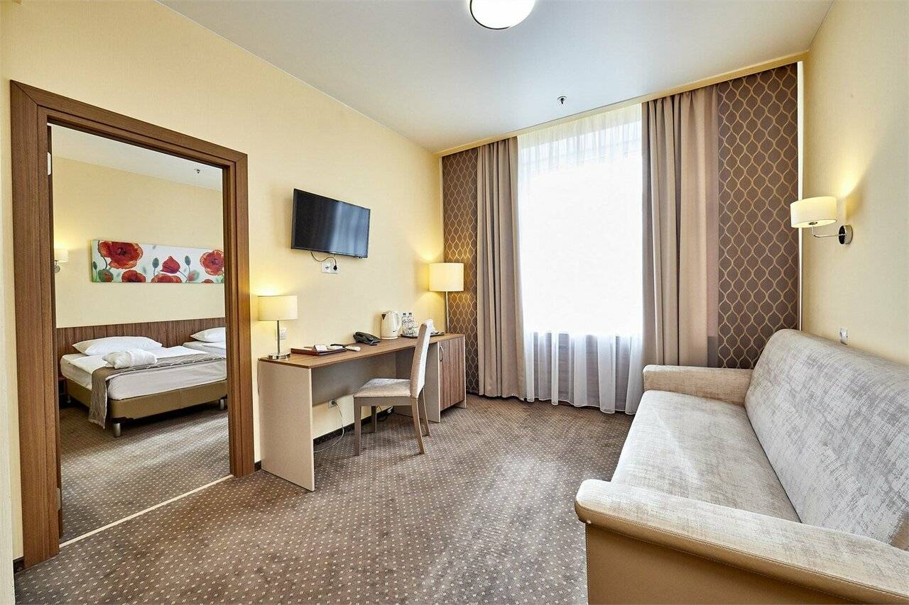 Фотографии номера Делюкс - двухкомнатный в Гостинице Россия Санкт-Петербург